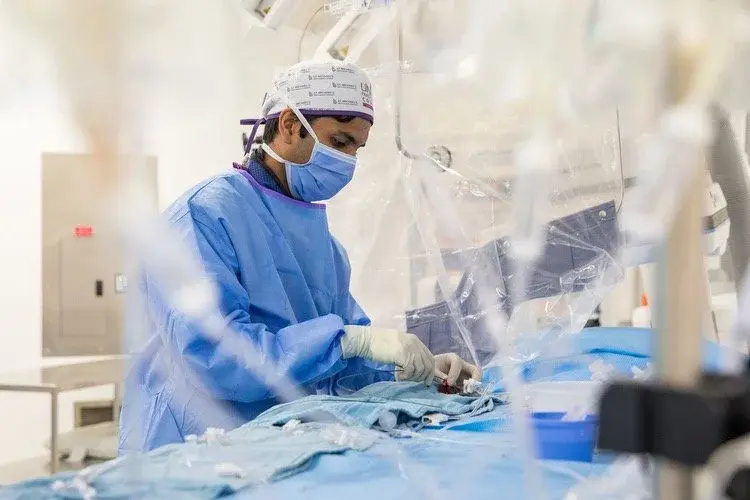 Neurosurgeon performing an endovascular procedure